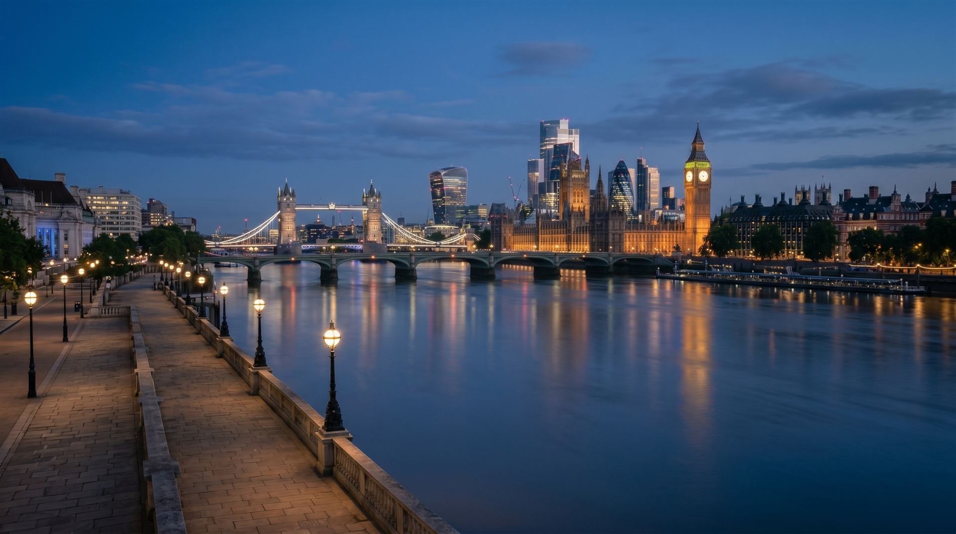 The River Thames and the London skyline at blue hour